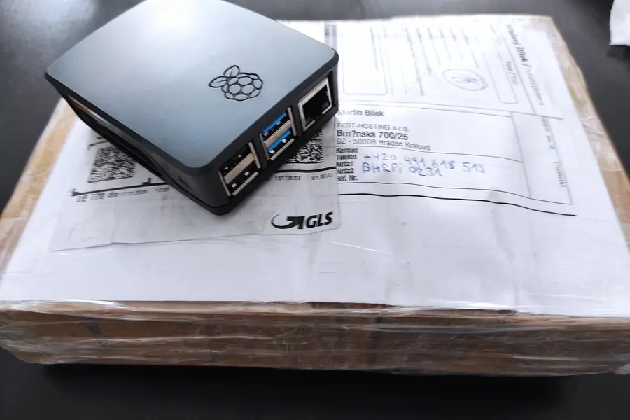 A parcel with a Raspberry Pi in a case that has arrived at the data centre